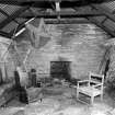 N-W range.  View of interior of house from SW, and note the two chairs and the scouts' troop flag.
Digital image of D 3475