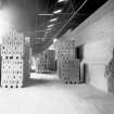 Interior view showing, brick packs, fork lift and side of kiln
