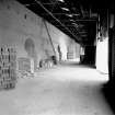 General view of the kiln, showing chamber entrance, and looking towards machine wing
