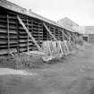 Exterior view showing E side of drying shed
Digital image of B 9481/9