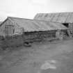 View from E of covered sheep dip and shed
Photographic print filed in MS/744/106
Digital image of D 4018/4