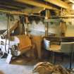 View on upper floor showing the winnowing machine with its various outlets. On the right is an electrically heated 'pease griddle' (for drying pease used for meal). This heater was made/installed in the early 1980's.
PRINT FILED IN MS/500/35/17
Digital image of B 26196 CN.