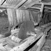 Interior detail of sawbench within sawmill located at the NE end of the grain mill.
Digital image of D 26683.