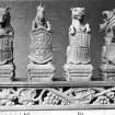 View of bear/wolf, unicorn, tiger/panther/lion and stag oak staircase finials, each holding a shield. Kinfauns Castle.