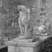 Detail of statue of dog at foot of stone stair (no.2 on plan), from South East.
Digital image of D 59519.
