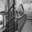 Service staircase, view of lift mechanism at third floor level
Digital image of A/34075