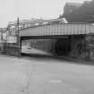 View from N showing bridge over Duke Street with part of Parkhead Forge in background