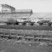 View from SE showing old bolster wagons and travelling crane in background