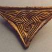 Triangular gilt-bronze plate with interlace decoration, from dagger hilt, from excavations by Brian Hope-Taylor. 