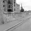 View from WSW showing WNW and SSE fronts of E wing castellated hoist block