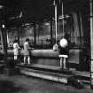 Interior
View showing women working on 27' setting loom