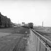 View from ESE showing NNE and part of ESE fronts with train transporting oil tanks