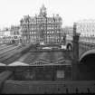 View from SSE showing W end of Waverly Station, with WSW front of North Bridge in foreground, North British Hotel in middle background and GPO building in right background