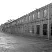 View from W showing MacDowall Street fronts of N and S buildings