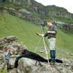 Robert Adam (RCAHMS) taking a survey photograph, with Dave Cowley in the background.
DIGITAL IMAGE ONLY