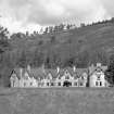 View from South East showing the lodge in its setting.
