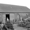 View from W showing WSW front of store and machine shop