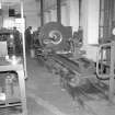 Interior
View showing long lathe in engineering shop