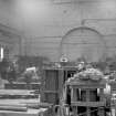 Interior
View showing men working in old bay