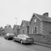 View of staff cottages from NE
Digital image of D 25702