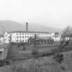 General view from SSW showing SSE and WSW fronts of mill complex.