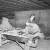 Interior
View showing woman working in hand moulding shop