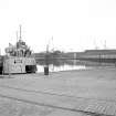 General view from ESE showing 'Norna' docked on S side of dock