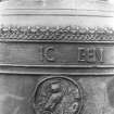 Detail of the Flemish bell at Eddleston, Scottish Borders, showing owl medallion and the words 'IC BEN', from the inscription 'IC BEN GHEGOTEN INT JAER ONS HEEREN MCCCCCVII' ('I was made in the year of Our Lord 1507').
