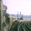 View looking WNW from locomotive 76074 showing Dalmuir train departing station