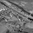 Scanned image of photograph showing oblique aerial view of Fort Augustus Locks and village.
