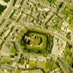 Oblique aerial view centred on the remains of Rothesay Castle, Bute.