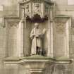 Detail of statue of Dr. Bell flanked by inscribed panels, Great Junction Street, Edinburgh.
