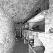 Interior, view of lower ground floor vaulted wine cellar under entrance court
Digital image of E 30953.