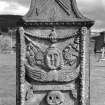 Peebles, Old Town, Old St. Andrew's Church, cemetery.
General view of the headstone of Agnes Cushny, died, 1809, with set square and dividers in pediment, festoon and swag around central winged soul, skull and 'Memento Mori' Ribband with oak leaves at the ends.
Digital image of A 34909 PO