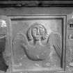 Peebles, Old town, Old St. Andrew's Church cemetery.
General view of end panel of the table tomb of Margaret Henrie, died 1765. A large winged soul with curled hair.
Digital image of B 4146/13