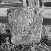 Dunning, St. Serf's Parish Church, Graveyard.
General view of headstone to Thomas Rutherford, 1623. Incised skull/head.
Scanned image of A 37032 PO