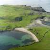 Oblique aerial view of the remains of the fishing station and homestead, Fethaland, North Roe taken from the E.