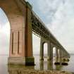 Digital image of view from SSE of south end of bridge, with foundation of old bridge pier in foreground