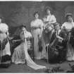 View of members of the Mather family with instruments, 16 Leamington Terrace, Edinburgh.