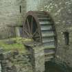 View from NE showing waterwheel on Old Barony Corn Mill.
Copy of 35 mm colour transparency.