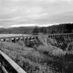 General view from NW. Laggan Dam impounds water to be used in the generating station of the Lochaber Aluminium Works, Fort William.
Copy of 35 mm black and white negative.