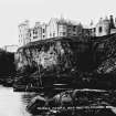 Digital image of photographic copy of postcard view from cliffs.
Insc: 'Slains Castle and Rocks Cruden Bay'.
