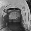 Interior.
View of End of Discharge Tunnel and Turbine Draught Tube at Mullardoch Subsidiary Generating Station.
Copy of negative, Mullardoch-Fasnakyle-Affric, Box 869/2, Contract No. 9, Plate No. 227.