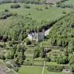 Oblique aerial view of Dunrobin Castle, walled garden and formal gardens, taken from the NE.