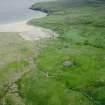 Oblique aerial view of Mingulay Bay and township from NNW.