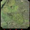 Scanned image of vertical aerial photograph.  Shows an area around Duddingston, Prestonfield and Arthur's Seat.