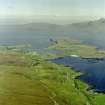 General oblique aerial view of Sanday and SE coast of Canna looking ESE towards Rum (Rhum).