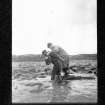 A member of the Churches Commission landing on Staffin, Skye.