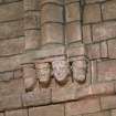 Detail of carved head corbels.