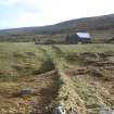 Scanned image of colour slide.
Metalled trackway and schoolhouse, viewed from N.
